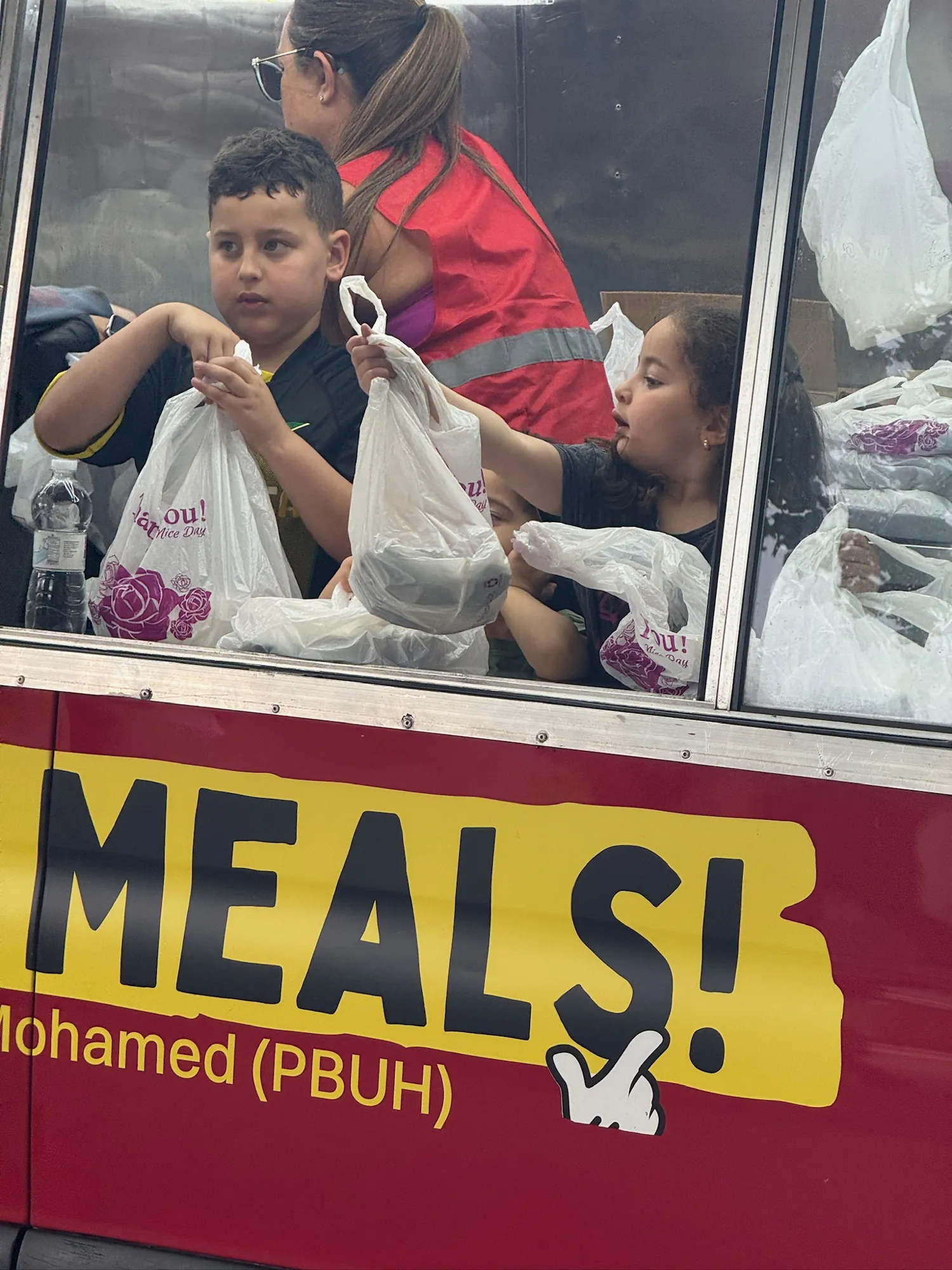 Staten Island route, neighbors getting meals at Tompkinsville.